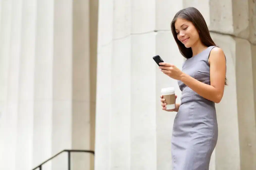 A woman looking refreshed with healthy skin on her lunch break.